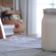 Jar of fresh cashew milk on the kitchen table
